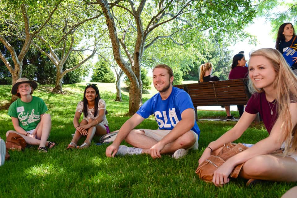 Students sitting together in the shade