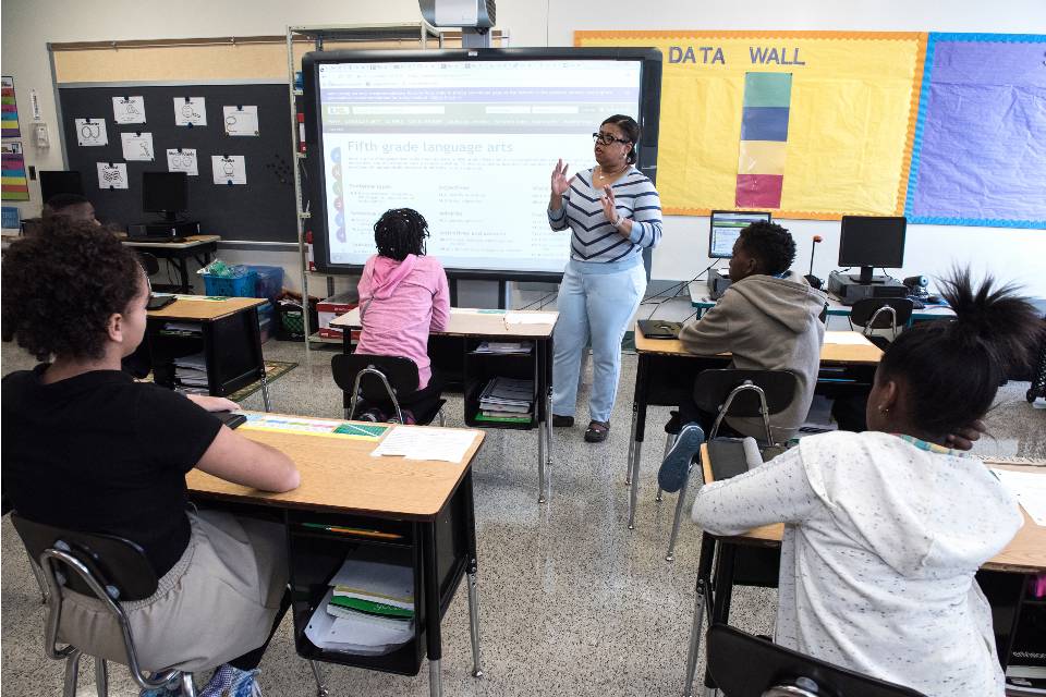 Teacher and students in classroom 