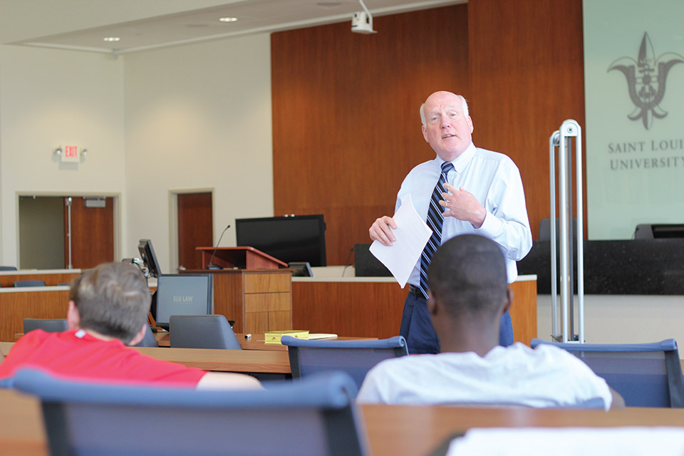 John Ammann speaking to students