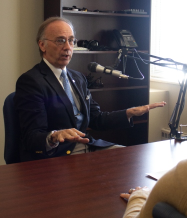 photo of professor greg willard in the podcast studio