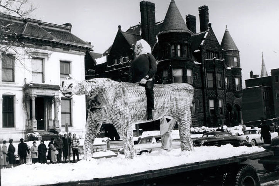 The Billiken rides a cougar at homecoming