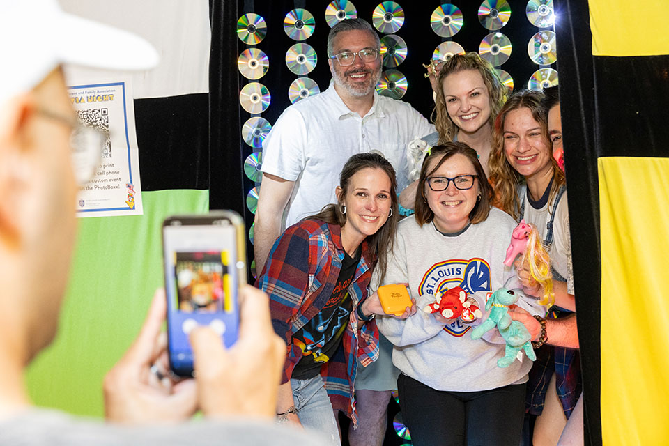 SLU staff members posing for a photo at the 2024 BPFA Trivia Night