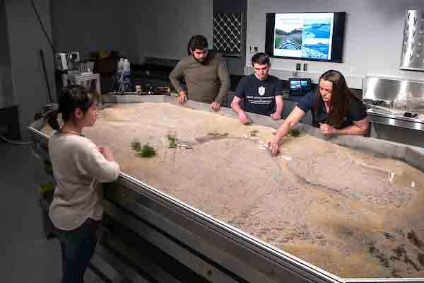 Students at water table